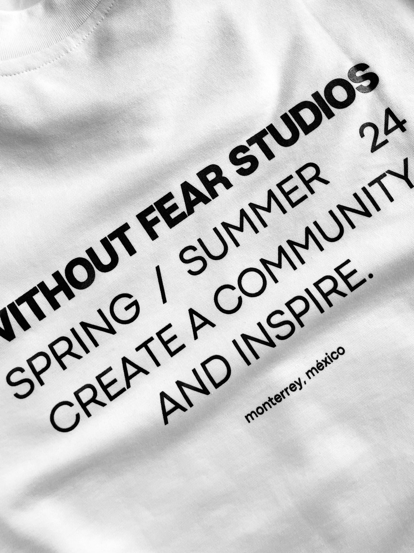 community tee white